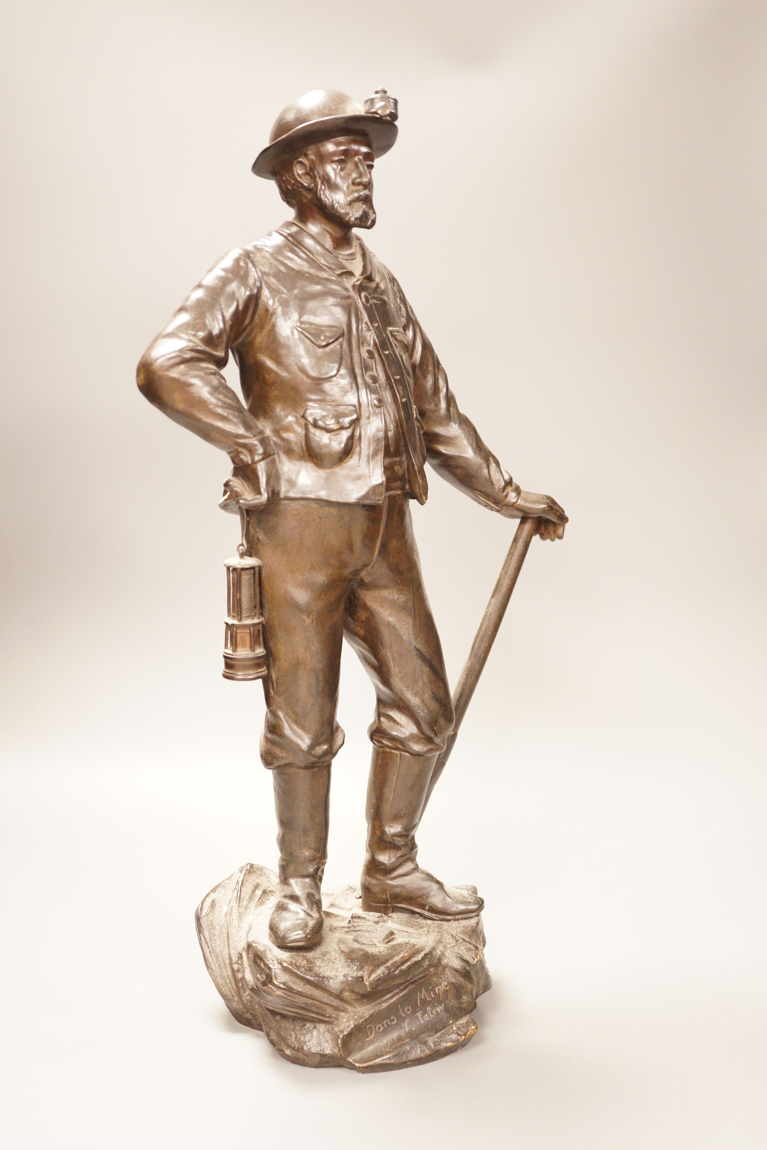 A French bronze figure, 'Dans la mine, par N. Telriv', 48cm